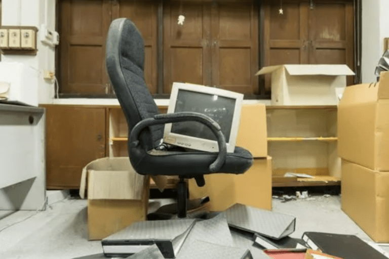 Old office furniture ready to be taken away.