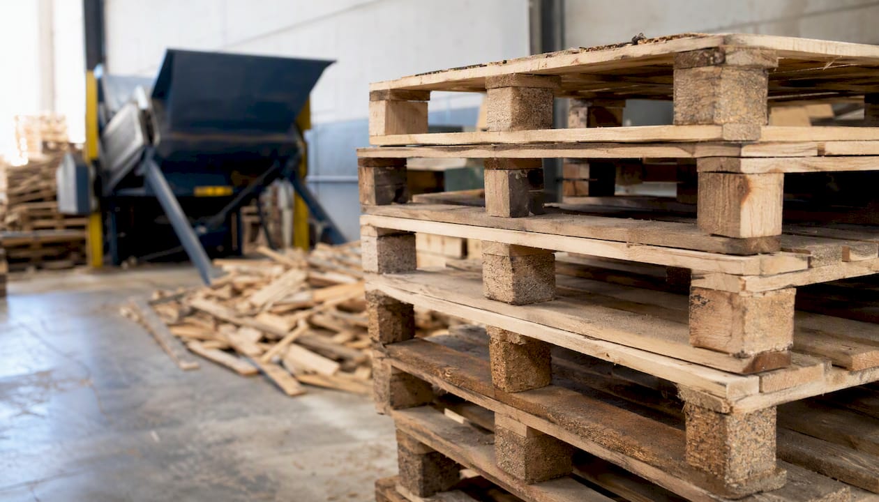 Stack of untreated wood pallets ready for recycling