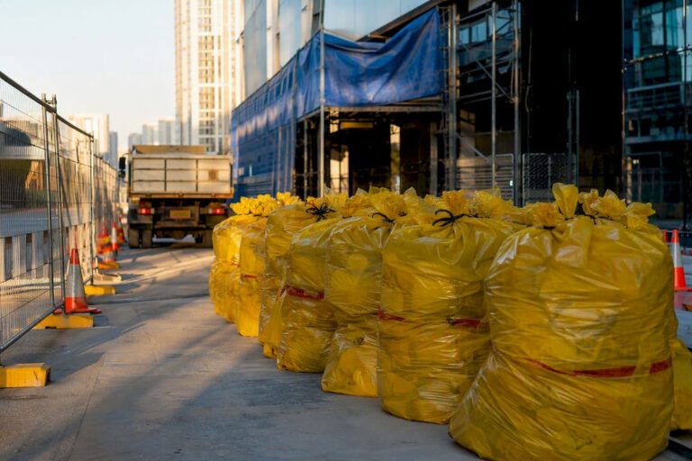 Sealed asbestos waste bags at commercial site