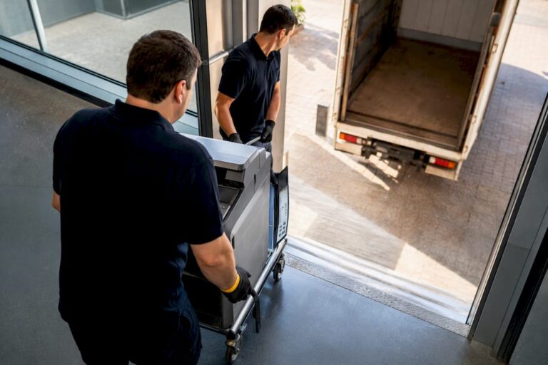 Commercial copier being removed from office