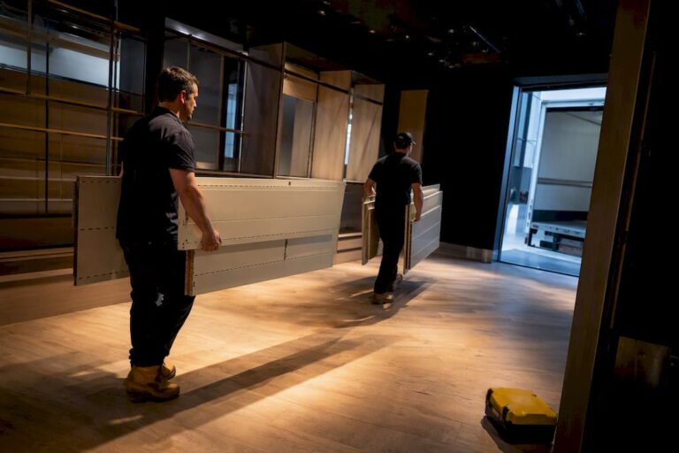 Workers clearing a commercial retail tenancy