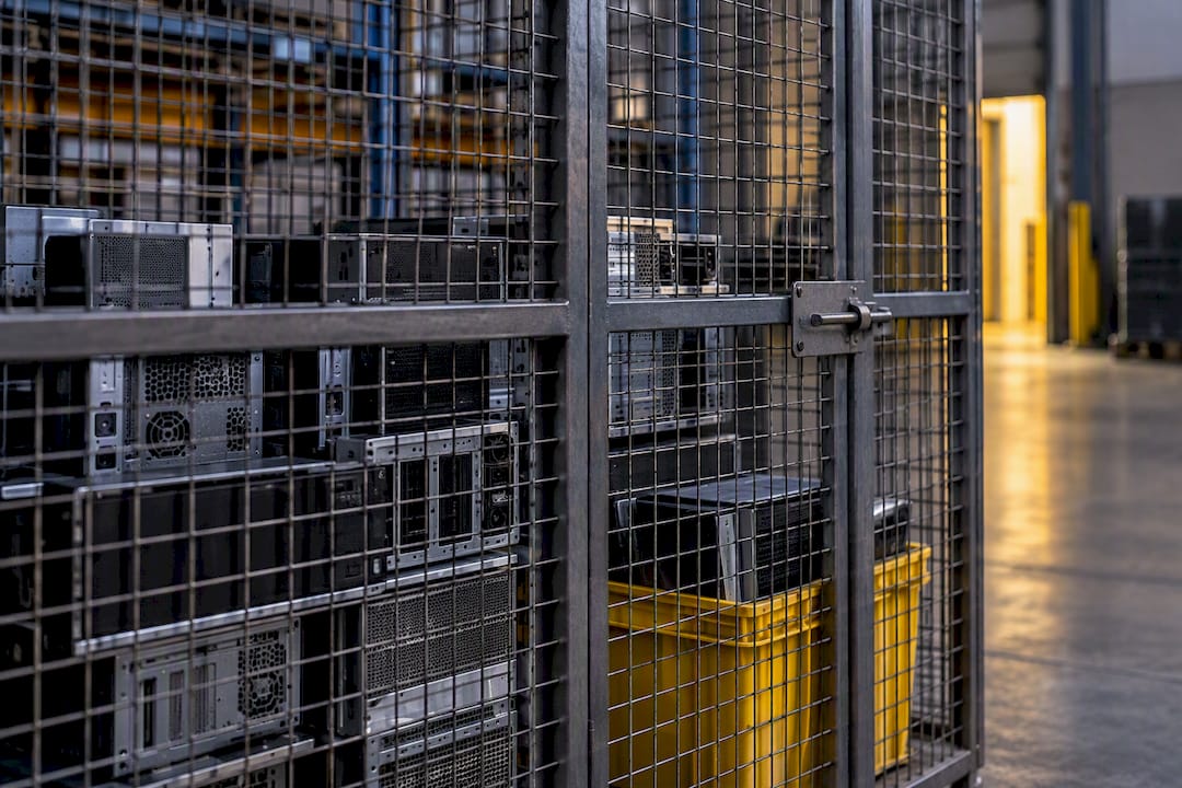 Locked staging cage for office electronics